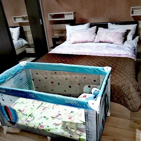 за гости в Апартамент *